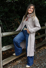 Load image into Gallery viewer, long turtleneck sweater with front split. pairs well with the twilly rag as pictured and dark denim jeans 
