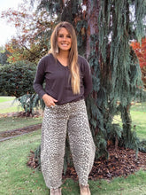 Load image into Gallery viewer, leopard barrel pants paired with a basic long sleeve sweater 

