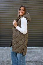 Load image into Gallery viewer, olive quilted puffer vest with a hood and zipper front 
