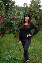 Load image into Gallery viewer, long sleeve henley top with button front detail on neckline and buttons on the cuff 
