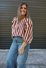 Load image into Gallery viewer, Woman wearing a brown stripe 3/4 sleeve bubble sleeve v-neck top
