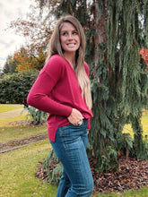 Load image into Gallery viewer, V neck front seam sweater paired with denim jeans 
