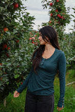 Load image into Gallery viewer, forest henley green top with buttons and buttons on the sleeves. 
